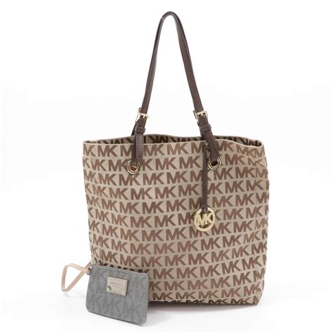 michael kors monogram tote with leather corners|michael kors canvas tote.